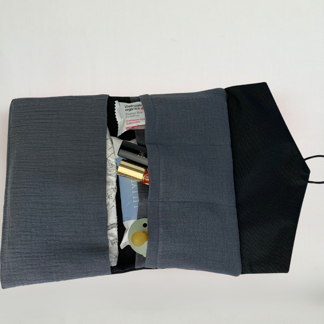 Minimalistische Wickeltasche in Schwarz – stilvoll und universell kombinierbar